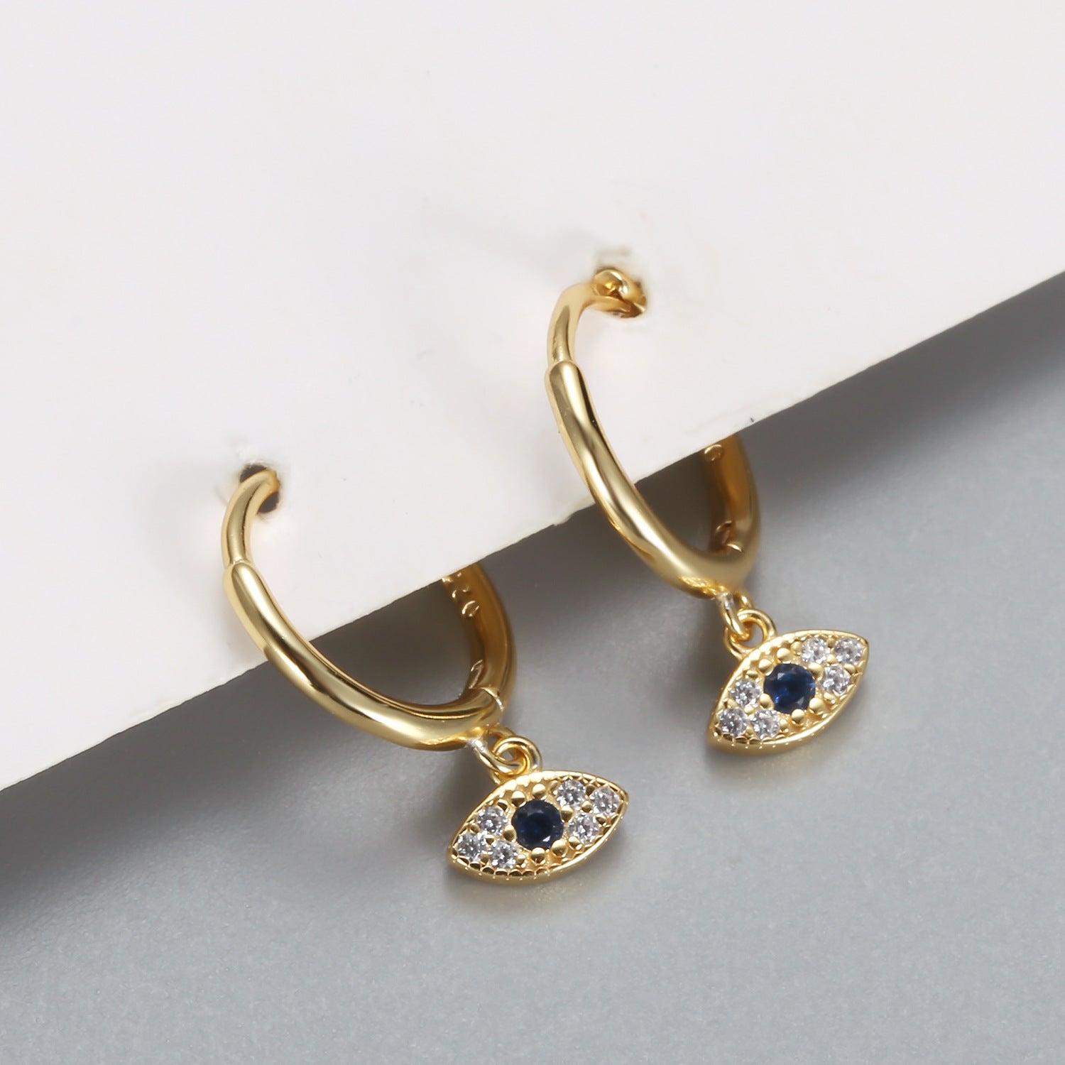 Die Sienna Evil Eye Ohrringe - Gold - Schutz trifft auf Eleganz